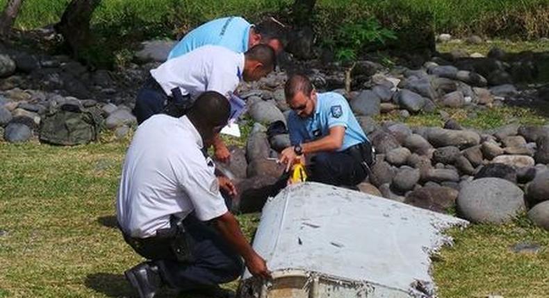 France says wing part found on Reunion island definitely from MH370