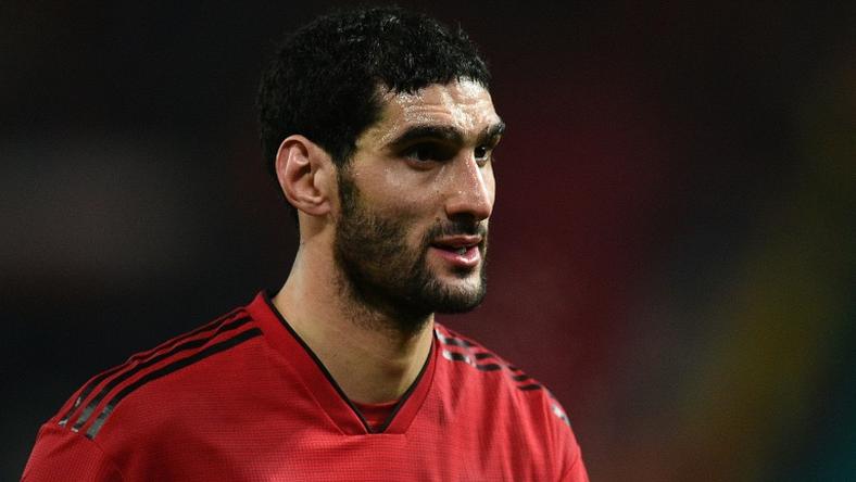 Marouane Fellaini arrived in Hong Kong on Sunday to meet with teammates but flew home to Belgium that night for treatment