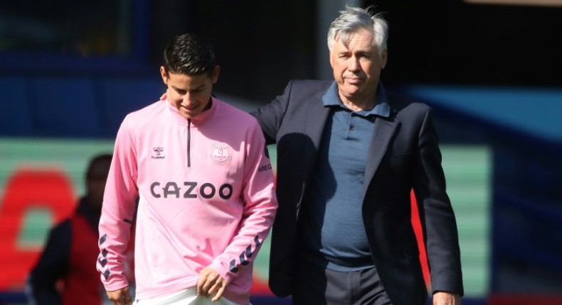 Easy pickings: Carlo Ancelotti (right) claims even he could score goals for Everton playing in front of James Rodriguez (left)