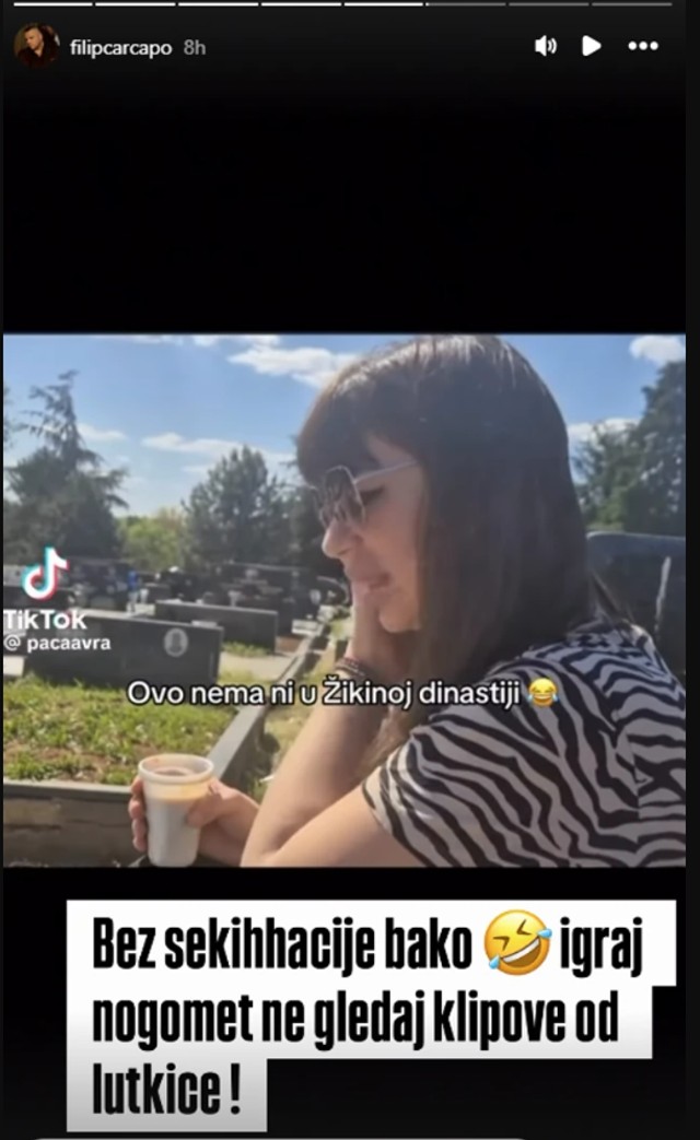 Miljana Kulić na babinom grobu 