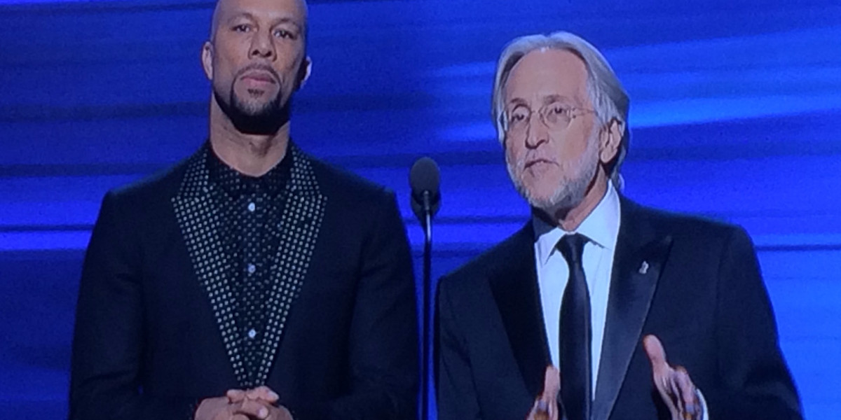 Common, left, and Neil Portnow, the president of the National Academy of Recording Arts and Sciences.