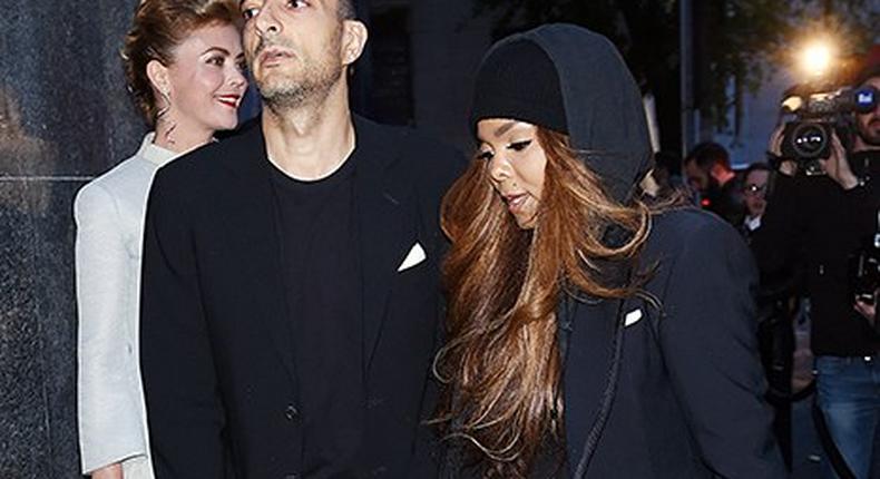 Wissam Al Manaso and Janet Jackson walking hand in hand