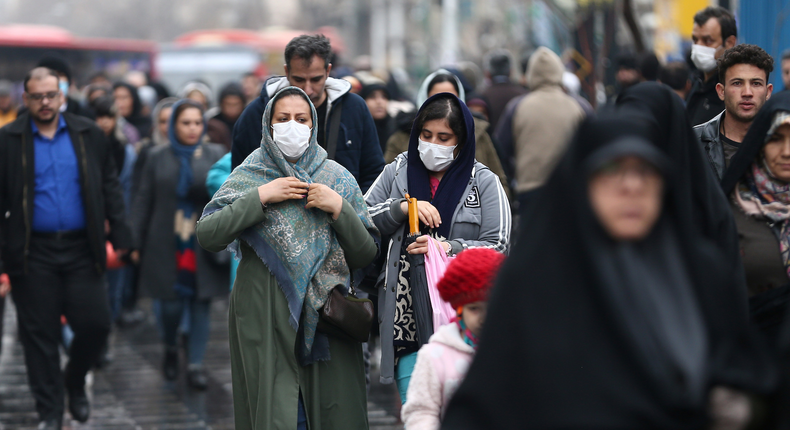 Iranian women wear protective masks to prevent contracting a coronavirus, as they walk at Grand Bazaar in Tehran, Iran February 20, 2020. WANA (West Asia News Agency)/Nazanin Tabatabaee via REUTERS