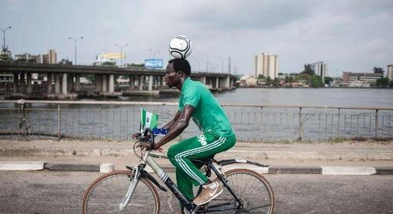 Harrison Chinedu rides 64 miles with a ball balanced on his head