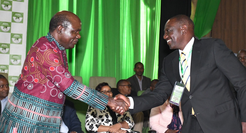 IEBC Chair Wafula Chebukati with Dr William Ruto when the Commission cleared the Kenya Kwanza candidate to vie in the 2022 presidential election on June 4, 2022