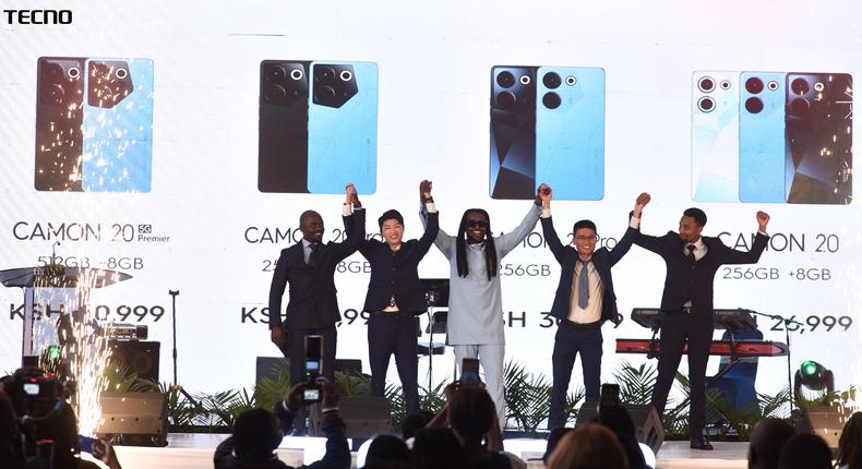 From left, Antony Brian Otieno, Retail Manager, TECNO Kenya, Ray Fang, Country Manager, TECNO, CAMON 20 series Brand Ambassador, Nyashinski, TECNO Kenya Brand Manager, Peter Shi and Product & Training Manager, Linus Ngutui celebrate the official launch of the CAMON 20 series in Kenya