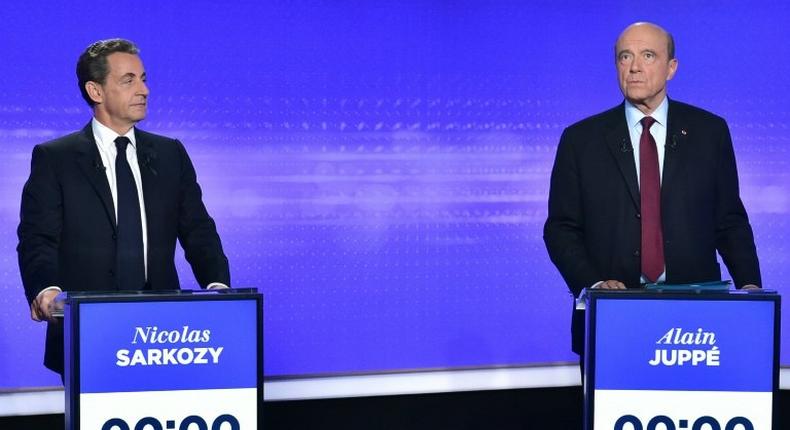 Former French president Nicolas Sarkozy (left) and ex-premier Alain Juppe prepare to take part in a televised debate in Paris, on November 17, 2016