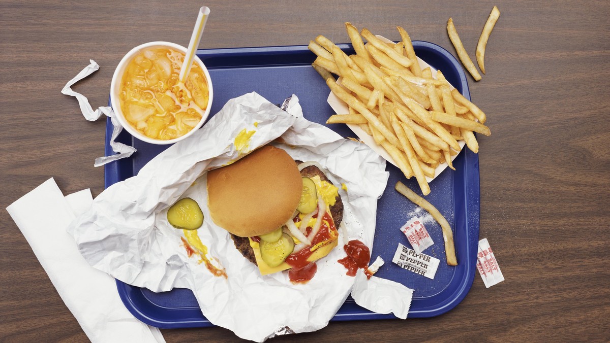 Elevated View of a Tray With Fries, a Hamburger and Lemonade