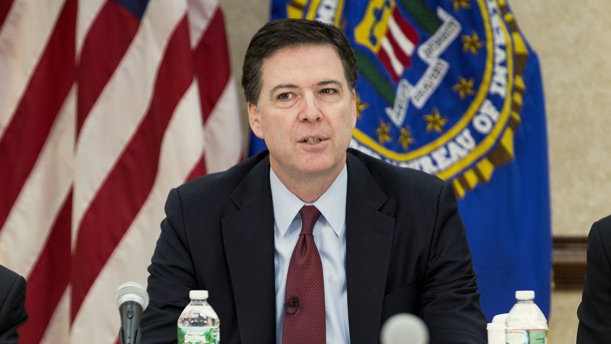 FBI Director Comey speaks during a news conference on the release of the 9/11 Review Commission report in Washington