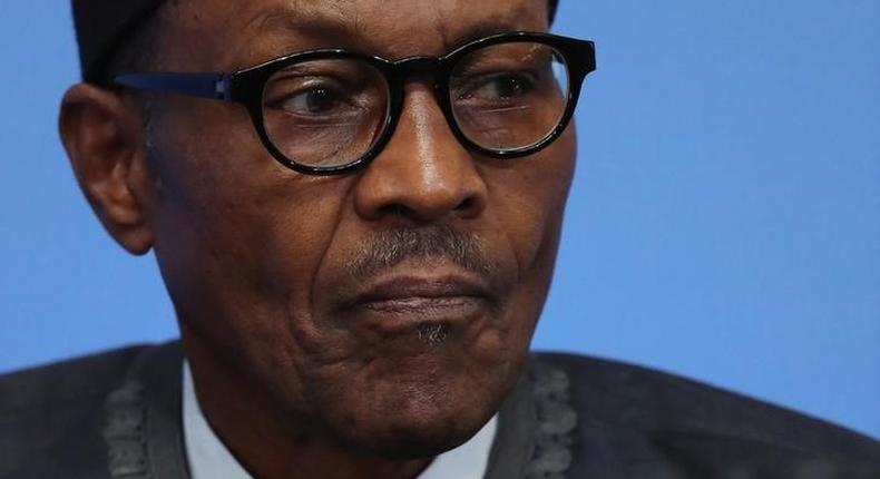 Nigerian President Muhammadu Buhari listens as British Prime Minister Cameron opens the international anti-corruption summit on May 12, 2016 in London, England.  REUTERS/Dan Kitwood/Pool