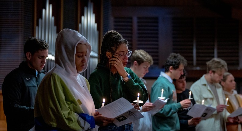 Students gather at a vigil for the victims of a mass shooting at Michigan State University on February 13.Nic Antaya/Getty Images