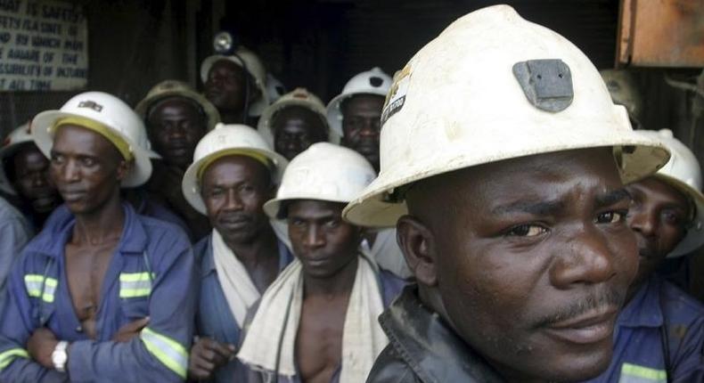 Konkola Copper Mines PLC workers wait in a lift before going to work underground in Konkola, in this file photo. DAVOS/AFRICA REUTERS/Stringer