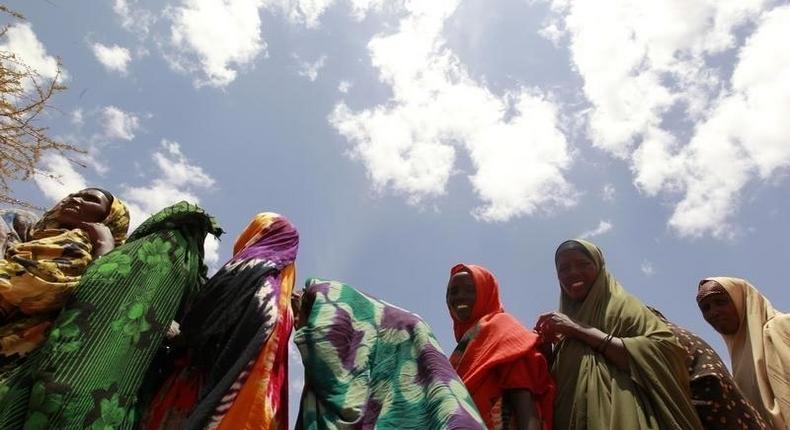 Displaced women queue for non-food items from the United Nations High Commissioner for Refugees at the Kabasa transit centre for the internally displaced people in Dollow town, along the Somalia-Ethiopia border, August 30, 2011. REUTERS/Thomas Mukoya