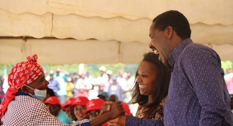 Agriculture CS Peter Munya with CAS Anne Nyaga during a seed distribution exercise in Mbeere on March 25, 2022