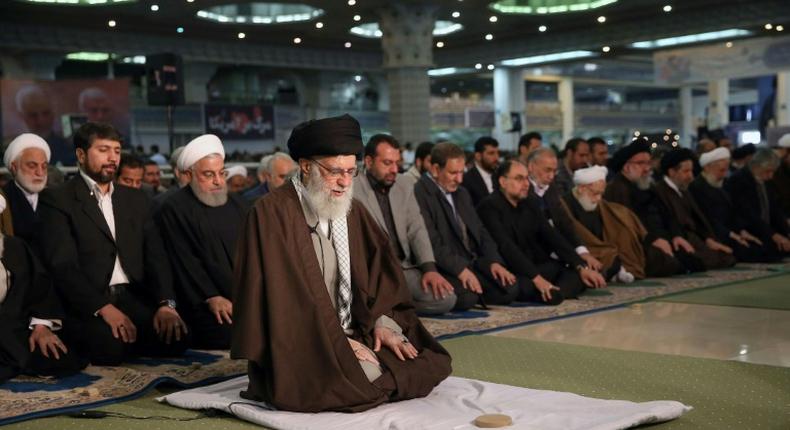 Iran's Supreme Leader Ayatollah Ali Khamenei on Friday labelled the governments of Britain, France and Germany American lackeys in a speech as he led the main weekly Muslim prayers in Tehran for the first time since 2012

on January 17, 2020, shows Khamenei (C) leading Friday prayers during a ceremony at the capital Tehran’s Grand Mosallah (mosque), while flanked by President Hassan Rouhani (C-L, behind).