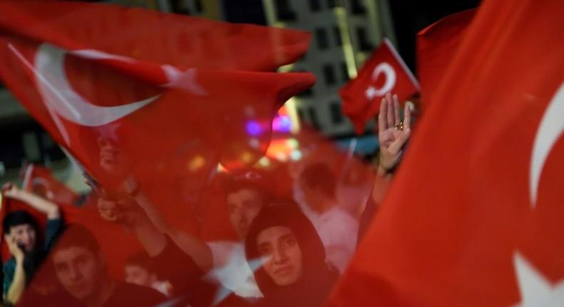 Supporters of Turkish President Recep Tayyip Erdogan rally in Istanbul after a failed coup in July 2016