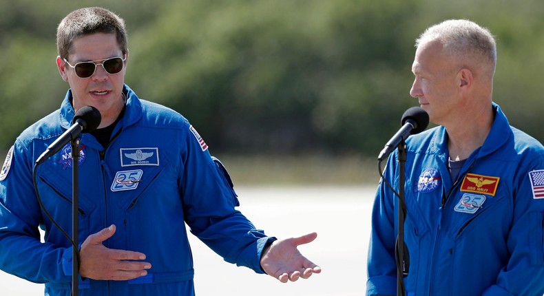 NASA astronauts Robert Behnken, left, and Doug Hurley speak during a news conference in Cape Canaveral, FL, May 20, 2020. (AP Photo:John Raoux)