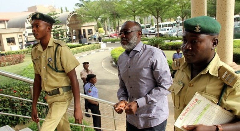 Olisa Metuh appears in an Abuja court in handcuffs on January 25, 2016