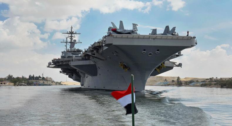 The USS Abraham Lincoln sails south in the Suez canal near Ismailia, Thursday, May 9, 2019.