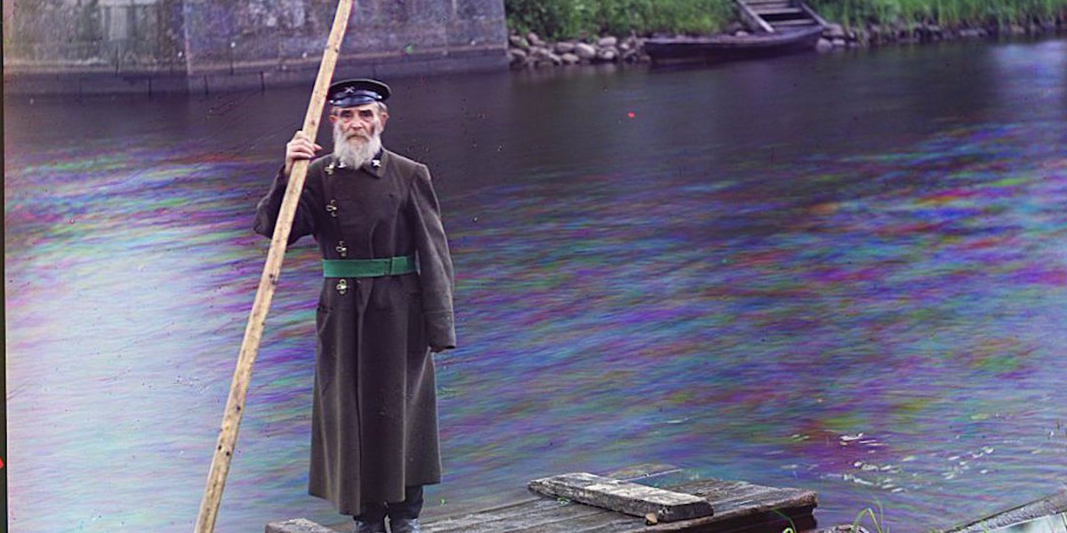Pinkhus Karlinskii, the eighty-four years supervisor of Chernigov floodgate, poses for a photo.