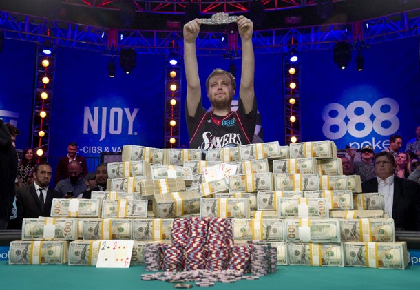 McKeehen of Philadelphia holds up the championship bracelet after winning the World Series of Poker 