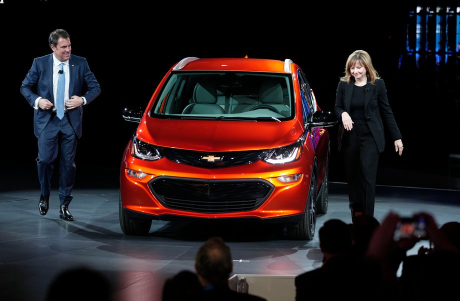 Mary Barra, Chairman and CEO of General Motors, and Mark Reuss, Executive Vice President of GM Global Product Development, reveal the Chevrolet Bolt EV to the news media at the 2016 North American International Auto Show January 11th, 2016 in Detroit, Michigan.