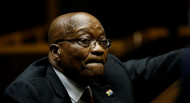 In the dock: Zuma pictured in court last November. He has been charged with 16 counts of graft linked to an arms deal from before he became president.