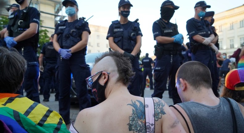 LGBT activists blocked a police vehicle