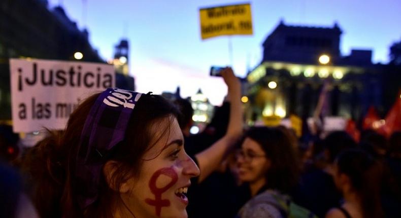 International Women's Day protesters in Madrid called for an end to domestic violence, a growing problem in Spain