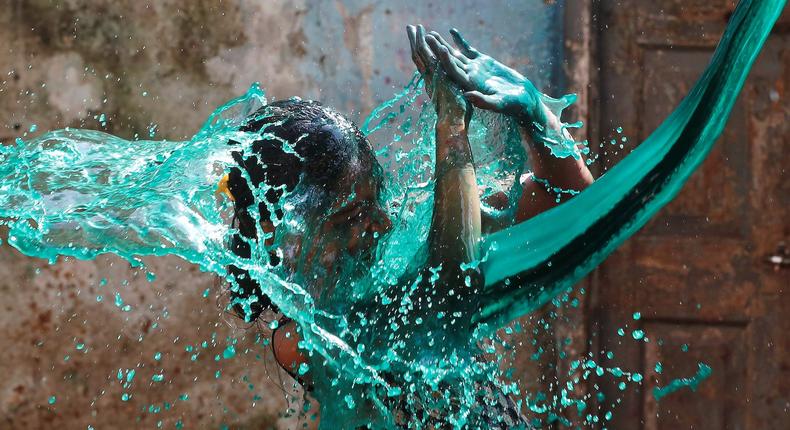 A girl celebrating Holi, the Festival of Colors, in Mumbai, India.