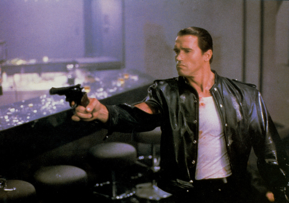 Arnold Schwarzenegger jako Mark Kaminsky, "Jak to się robi w Chicago", reż. John Irvin, 1986 r.