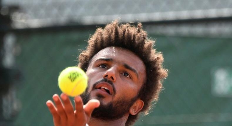 France's Maxime Hamou grabbed Eurosport journalist Maly Thomas around the neck and shoulders while she interviewed him following his first-round defeat on Monday