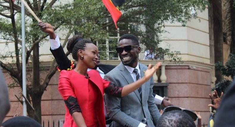 A past photo of Bobi Wine with his wife Barbie. The Ugandan politician caused excitement after landing at JKIA Nairobi 