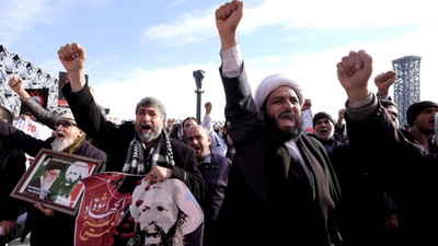 Iranian protesters chant slogans during a demonstration against the execution of Shi'ite cleric Shei