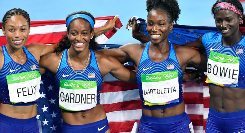 The United States team from left, Allyson Felix, English Gardner, Tianna Bartoletta and Tori Bowie celebrate winning the gold medal in the women's 4x100-meter relay final during the athletics competitions of the 2016 Summer Olympics.Martin Meissner/AP Photo