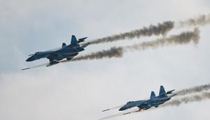 Russian Sukhoi Su-35 jet fighters fire missiles during the Aviadarts competition, as part of the International Army Games 2021, at the Dubrovichi range outside Ryazan, Russia.REUTERS/Maxim Shemetov