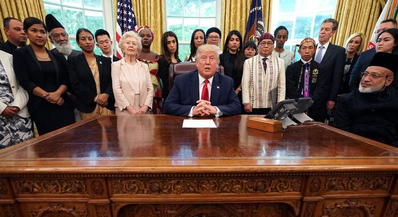 U.S. President Donald Trump hosts survivors of religious persecution from 17 countries around the world in the Oval Office at the White House July 17, 2019