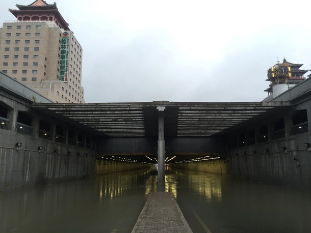 A flooded tunnel next to the Beijing West Railway Station is seen during a heavy rainfall in Beijing