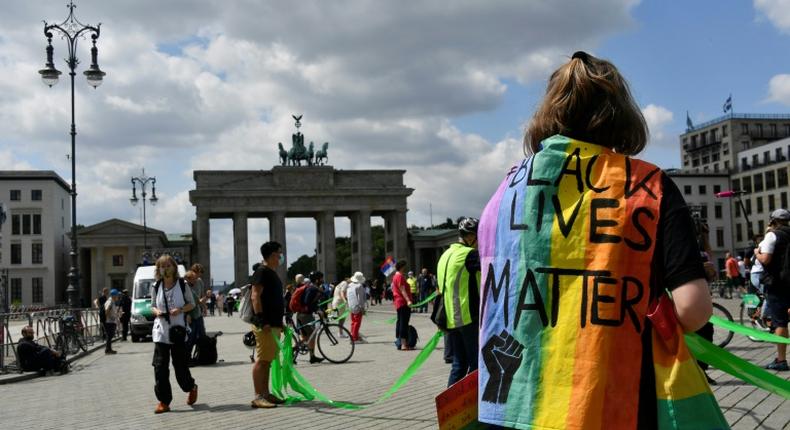 The route of the human chain -- stretching from the world-famous Brandenburg Gate past the landmark Communist-era TV tower at Alexanderplatz and into the ethnically diverse Neukoelln district -- had to be extended to accommodate the numbers