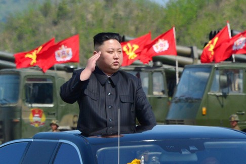 North Koreas leader Kim Jong Un watches a military drill marking the 85th anniversary of the establi