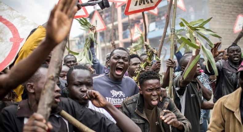 Supporters of Kenyan opposition presidential candidate Raila Odinga protest the election results in Nairobi's Mathare slum