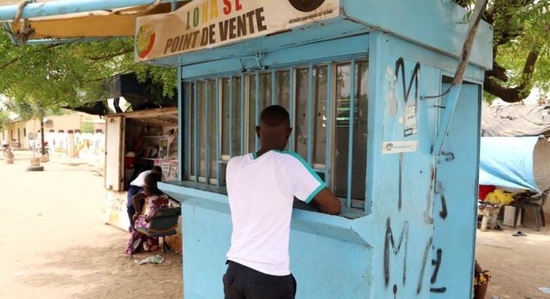 Les-kiosques-de-jeu-de-hasard-foisonnent-a-Dakar-750x430