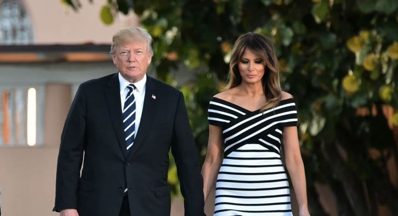 President Donald Trump and first lady Melania Trump matched in black and white stripes in April 2018.MANDEL NGAN/AFP via Getty Images