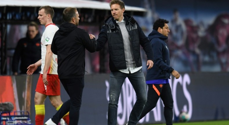 RB Leipzig coach Julian Nagelsmann (right) has been tipped to replace Hansi Flick (left) as head coach of Bayern Munich