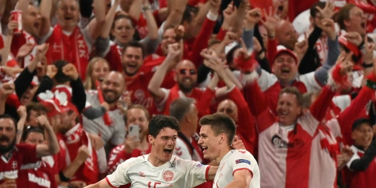 Denmark 'unit' rides wave of emotion into Wales last-16 ...