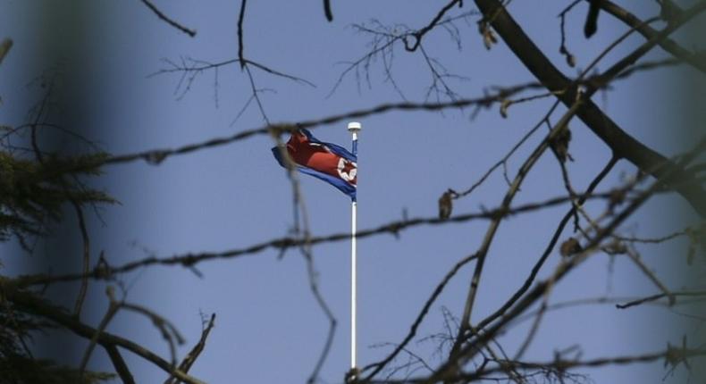 The North Korean national flag flies at the North Korean Embassy in Beijing. China remains the reclusive state's main provider of aid and trade