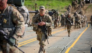 Soldiers with the 101st Airborne Division (Air Assault) execute a wet gap crossing with the 502nd Multi-Role Bridge Company, 19th Engineering Battalion on Fort Knox on April 28, 2022.Staff Sgt. Michael Eaddy/US Army