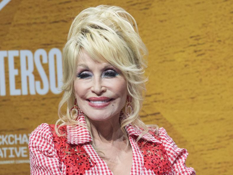 Country legend Dolly Parton also co-owns two companies. Rick Kern / FilmMagic