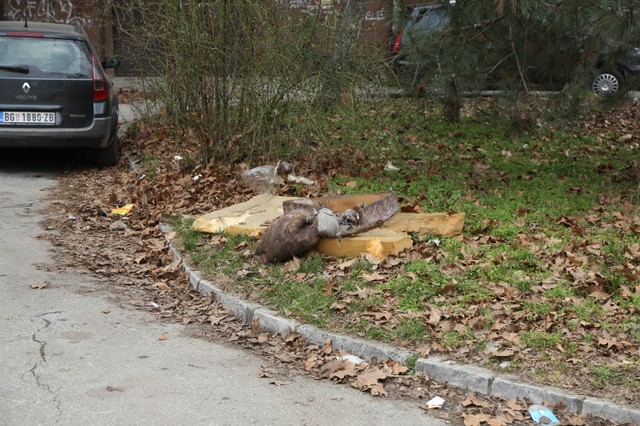 The body of the young man was covered with an old mattress.