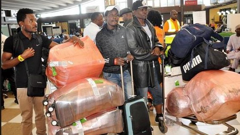 Some Nigerians recently evacuated from the United Arab Emirate. (Punch)